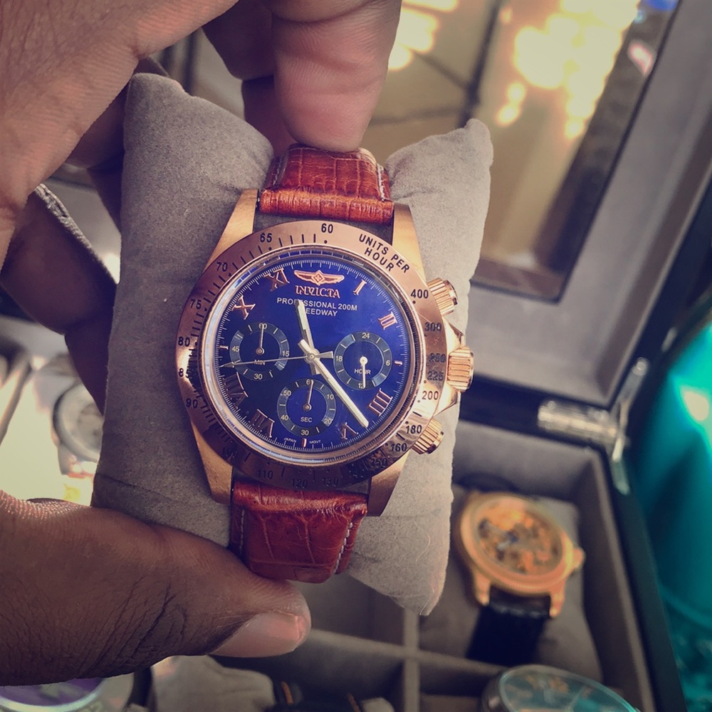 Men’s Invicta Professional wristwatch.